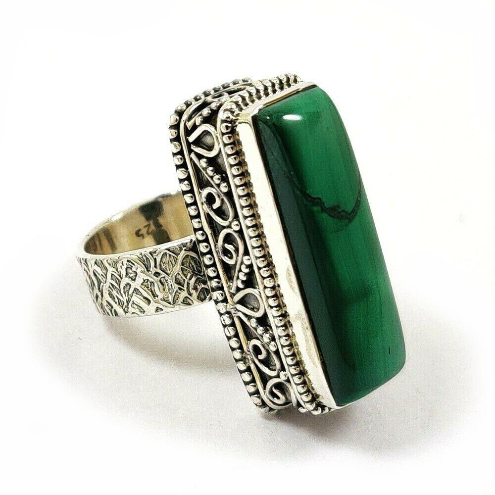 MALACHITE GEMSTONE 925 STERLING SILVER RING: MALACHITE GEMSTONE 925 STERLING SILVER RING Product Type : RING Main Stone : MALACHITE Main Stone Shape : FANCY Main Stone Size : 25X8 MM Main Stone Color : GREEN Metal : STERLING SILVER Metal Purity 