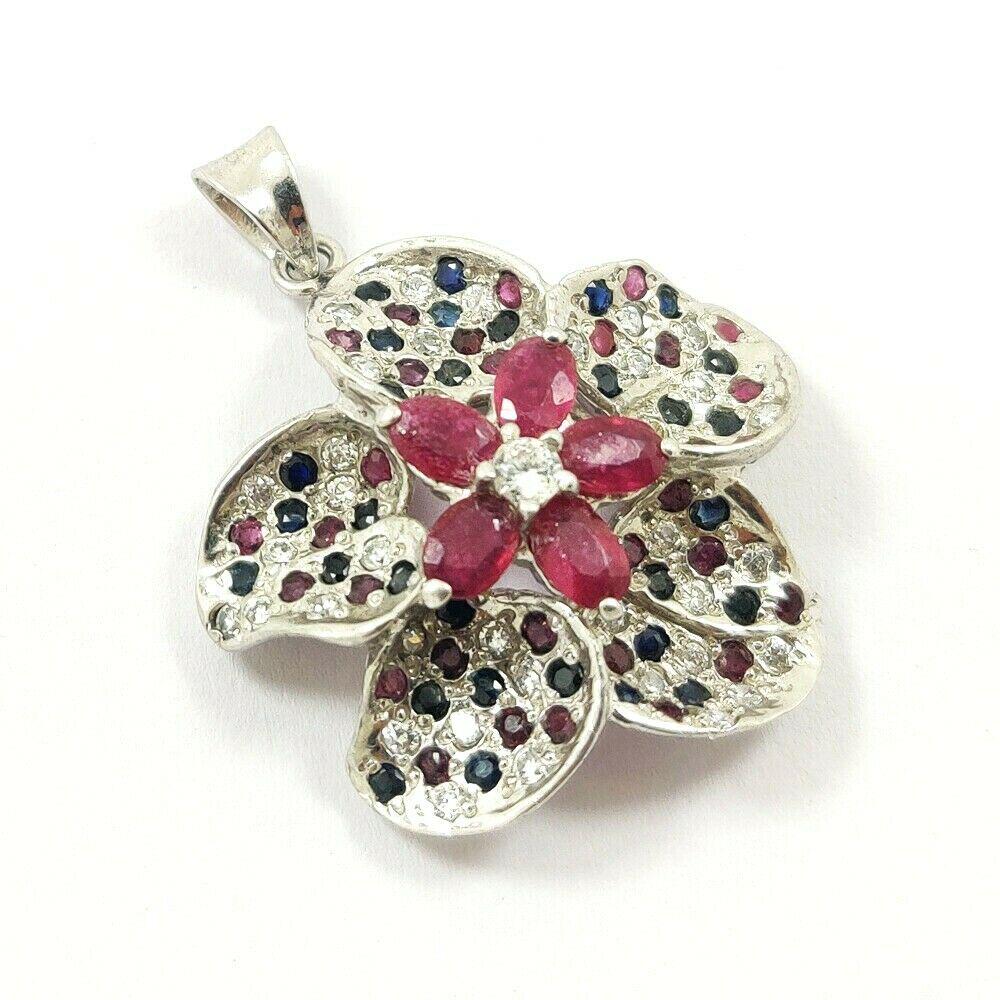 EMERALD/RUBY/SAPPHIRE 925 STERLING SILVER PENDANT: EMERALD/RUBY/SAPPHIRE 925 STERLING SILVER PENDANT Product Type : PENDANT Main Stone : EMERALD/RUBY/SAPPHIRE Main Stone Color : MULTICOLOR Metal : STERLING SILVER Metal Purity : 925 Pendant Size : 1.5"