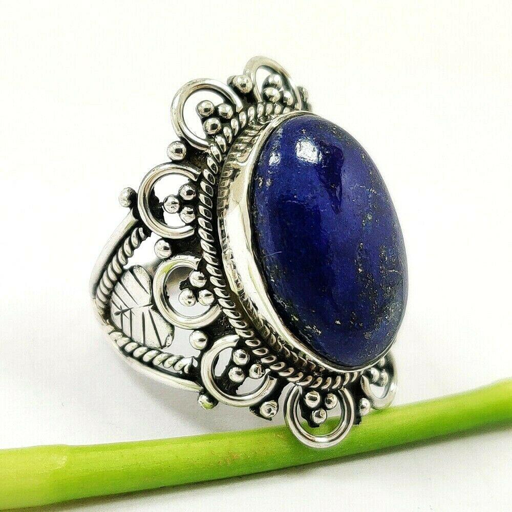 LAPIS LAZULI 92.5 STERLING SILVER RING: LAPIS LAZULI 92.5 STERLING SILVER RING Product Type : RING Main Stone : LAPIS LAZULI Main Stone Shape : OVAL Main Stone Size : 12X19 MM Main Stone Color : BLUE Metal : STERLING SILVER Metal Purity : 9