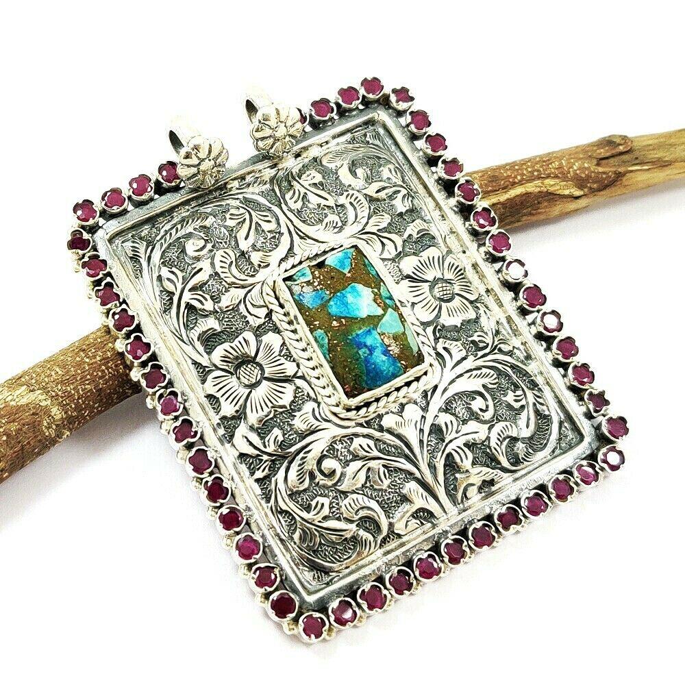 GOLDEN TURQUOISE & RUBY STERLING SILVER PENDANT: GOLDEN TURQUOISE & RUBY 92.5 STERLING SILVER VINTAGE PENDANT Product Type : PENDANT Main Stone : GOLDEN TURQUOISE & RUBY Main Stone Shape : OCTAGON Main Stone Size : 19X11 MM Main Stone Color : MULTIC