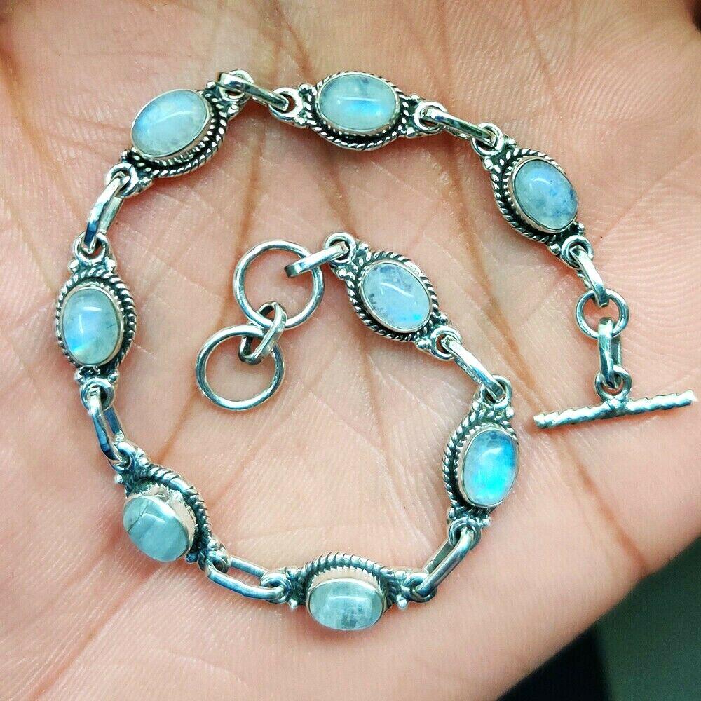 RAINBOW MOONSTONE 92.5 STERLING SILVER BRACELET: RAINBOW MOONSTONE 92.5 STERLING SILVER BRACELET Product Type : BRACELET Main Stone : RAINBOW MOONSTONE Main Stone Shape : OVAL Main Stone Size : 7X5 MM Main Stone Color : MULTICOLOR Metal : STERLING S