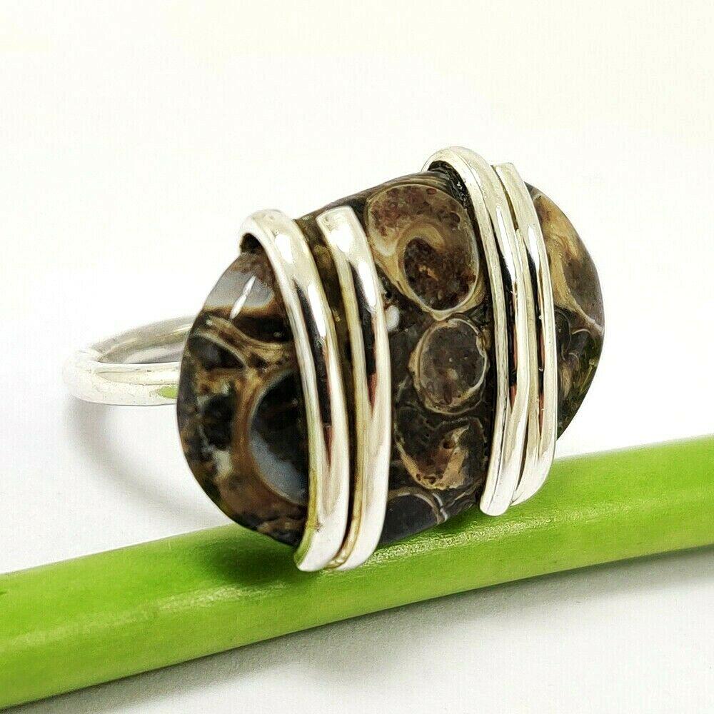 TURBELLARIA JASPER 925 STERLING SILVER RING: TURBELLARIA JASPER 925 STERLING SILVER RING Product Type : RING Main Stone : TURBELLARIA JASPER Main Stone Shape : OVAL Main Stone Size : 18X28 MM Main Stone Color : BROWN Metal : STERLING SILVER Meta