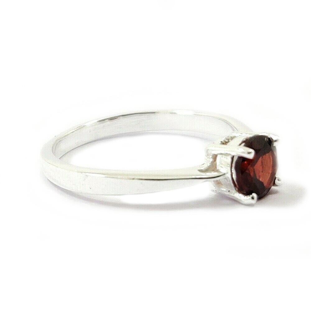 GARNET GEMSTONE STERLING SILVER RING: NATURAL GARNET GEMSTONE 925 STERLING SILVER HANDMADE RING JEWELRY GEMSTONE : GARNET STONE SHAPE : ROUND STONE SIZE : 6 MM METAL : STERLING SILVER METAL PURITY : 925 RING SIZE : AVAILABLE SIZES ( US 6/