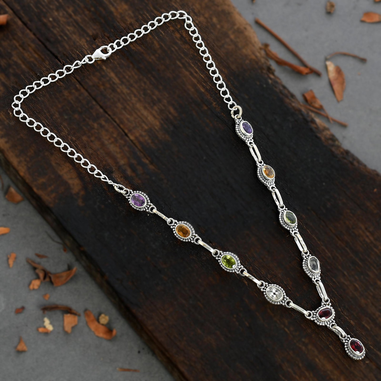 SEMI PRECIOUS MULTI GEMSTONE 92.5 STERLING SILVER: SEMI PRECIOUS MULTI GEMSTONE 92.5 STERLING SILVER NECKLACE Product Type : NECKLACE Main Stone : AMETHYST/CITRINE/PERIDOT/GARNET/TOPAZ Main Stone Shape : OVAL Main Stone Size : 7X5 MM Main Stone Color 