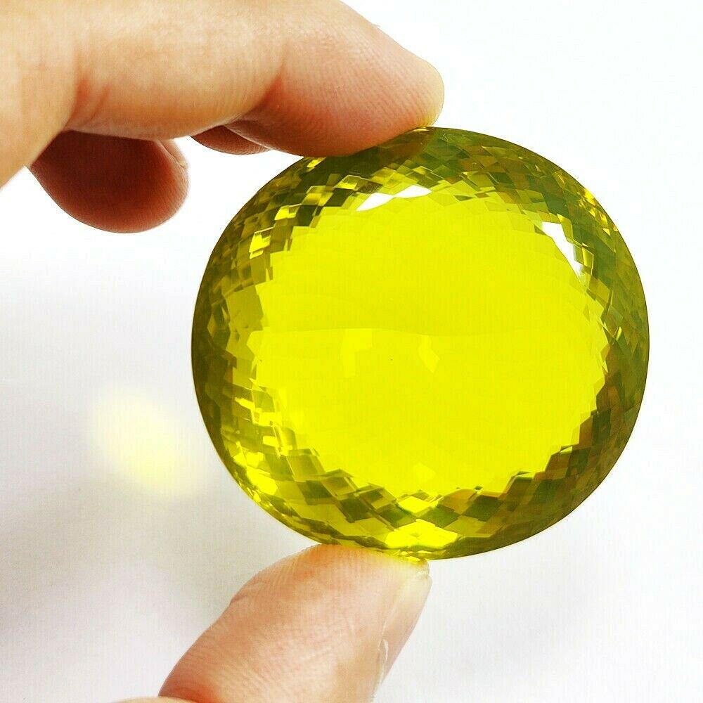 Natural Lemon Quartz Oval Faceted Cut 324.05 Carats: Gemstone : Lemon Quartz Shape : Oval Type : Faceted Cut Color : Green Size : 47x43x23 MM Weight : 324.05 Carats Country Of Origin : Brazil Country of Manufacture : India Shipping : Free Expedite shipp