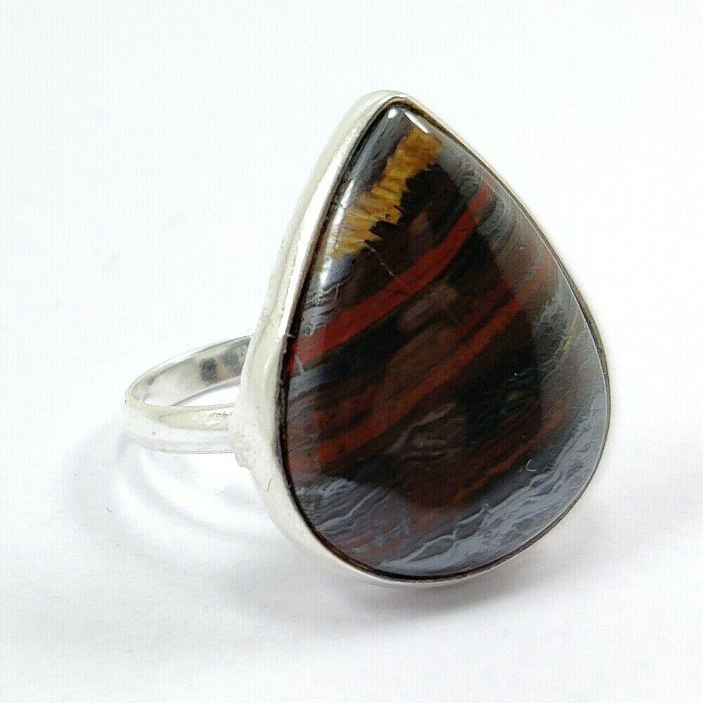 NATURAL IRON TIGER GEMSTONE 92.5 STERLING SILVER RING: NATURAL IRON TIGER GEMSTONE 92.5 STERLING SILVER RING Product Type : RING Main Stone : IRON TIGER Main Stone Shape : PEAR Main Stone Size : 24X19 MM Main Stone Color : MULTICOLOR Metal : STERLING SILV