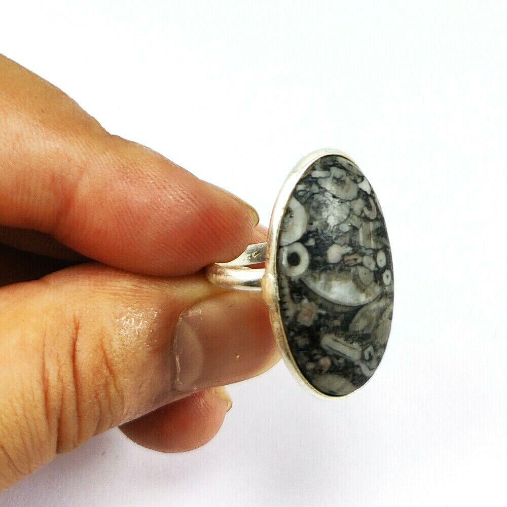 NATURAL CRINOID FOSSIL GEMSTONE 92.5 STERLING SILVER: NATURAL CRINOID FOSSIL GEMSTONE 92.5 STERLING SILVER RING Product Type : RING Main Stone : CRINOID FOSSIL Main Stone Shape : OVAL Main Stone Size : 28x16 MM Main Stone Color : MULTICOLOR Metal : STERL