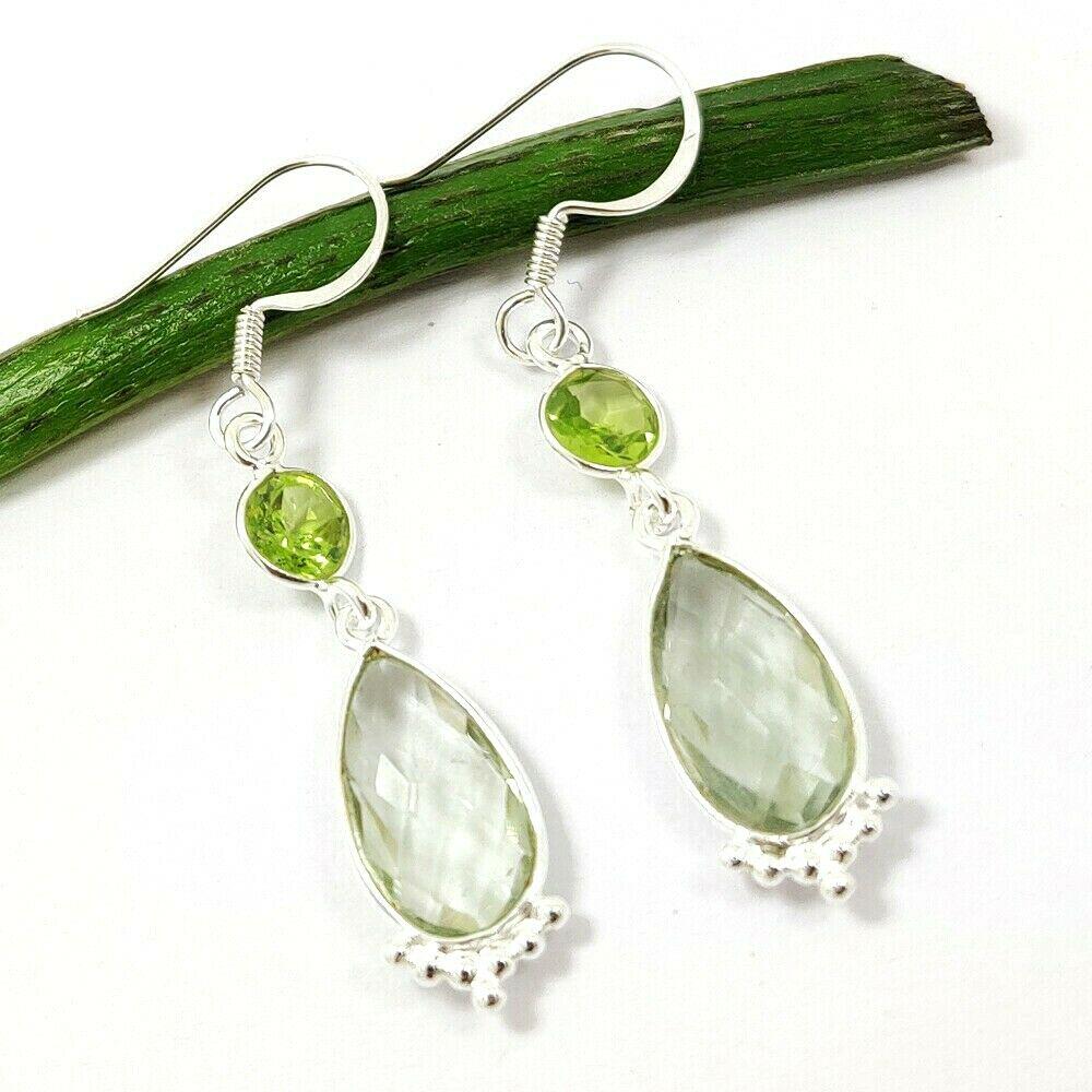 AMETHYST & PERIDOT GEMSTONE 92.5 STERLING SILVER: NATURAL GREEN AMETHYST, PERIDOT GEMSTONE 92.5 STERLING SILVER EARRING Product Type : EARRING Main Stone : GREEN AMETHYST, PERIDOT Main Stone Shape : PEAR Main Stone Size : 8X15 Main Stone Color : GREE