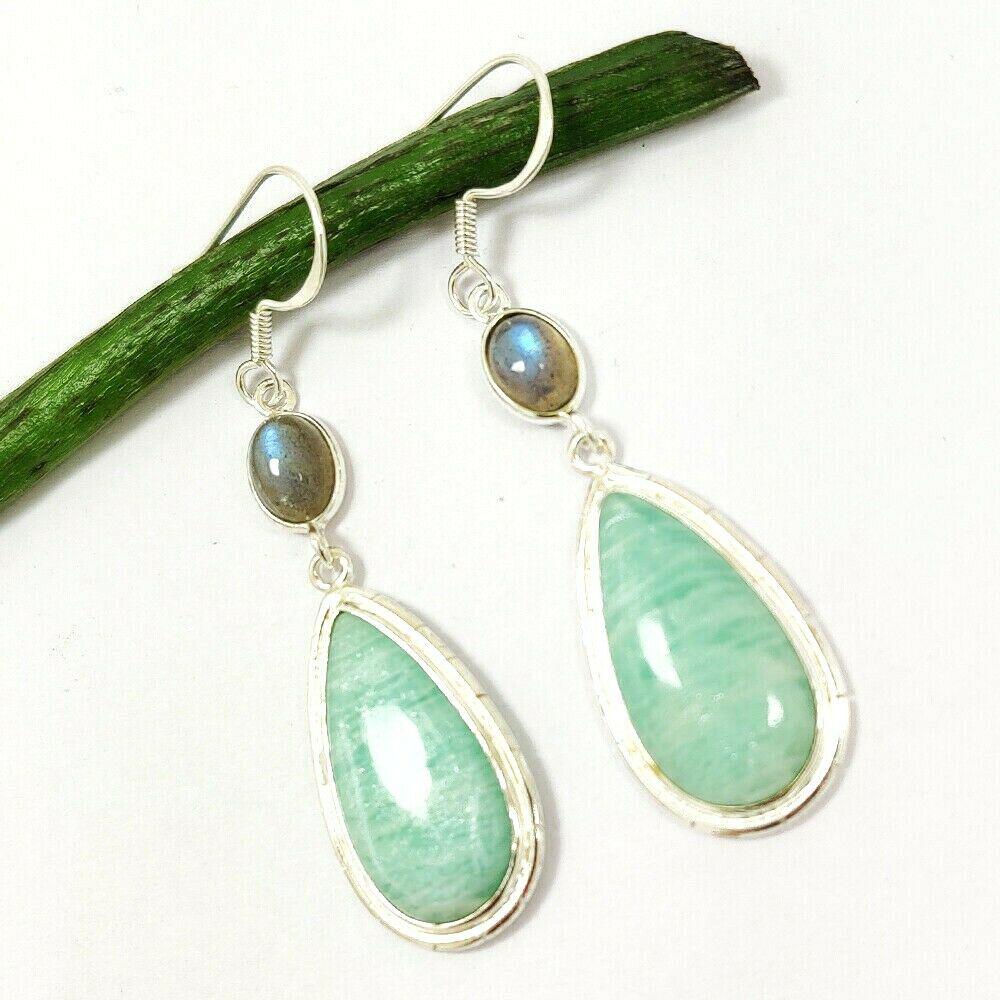 AMAZONITE & LABRADORITE GEMSTONE 92.5 STERLING SILVER: NATURAL AMAZONITE, LABRADORITE GEMSTONE 92.5 STERLING SILVER EARRING Product Type : EARRING Main Stone : AMAZONITE, LABRADORITE Main Stone Shape : PEAR Main Stone Size : 12X30 Main Stone Color : MULTI