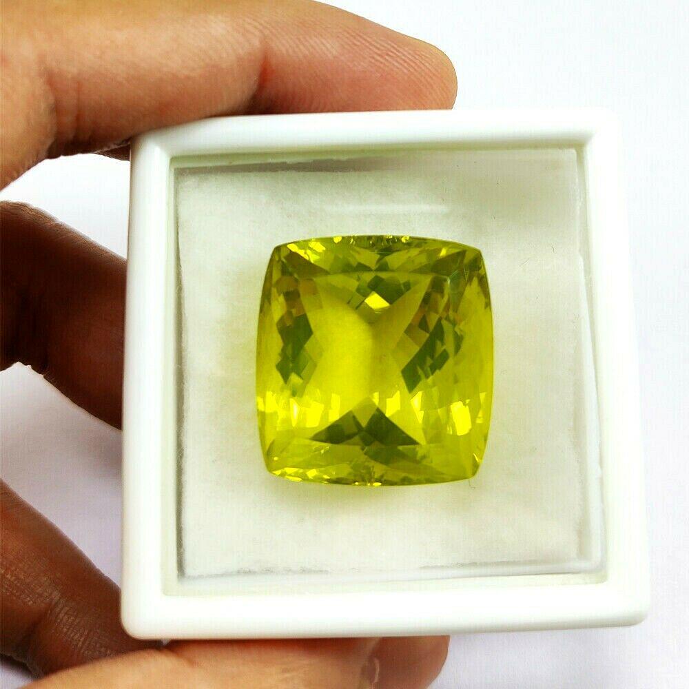 Natural Lemon Quartz Cushion Faceted Cut 64.5 Carats: Gemstone : Lemon Quartz Shape : Cushion Type : Faceted Cut Color : Green Size : 24x24x15 MM Weight : 64.5 Carats Country Of Origin : Brazil Country of Manufacture : India Shipping : Free Expedite ship