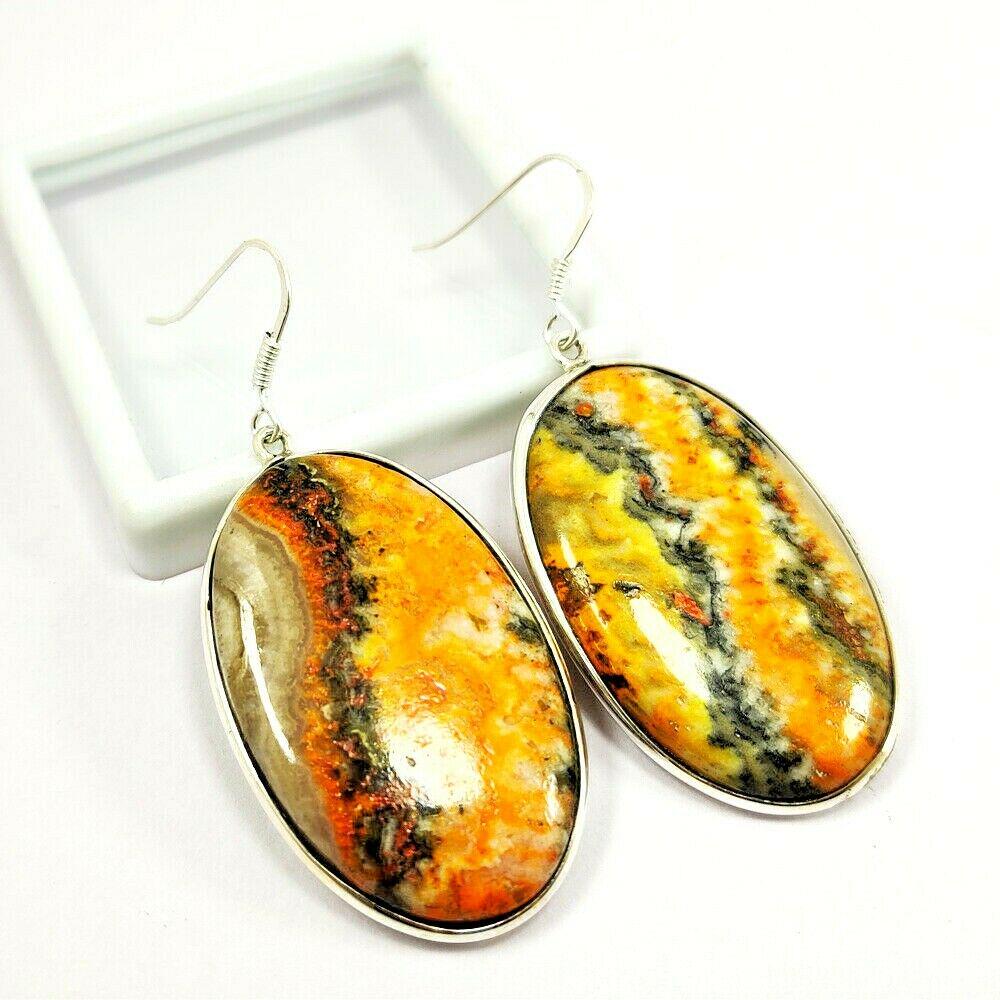 BUMBLE BEE JASPER GEMSTONE 92.5 STERLING SILVER EARRING: NATURAL Bumble BEE JASPER GEMSTONE 92.5 STERLING SILVER EARRING Product Type : EARRING Main Stone : Bumble BEE JASPER Main Stone Shape : OVAL Main Stone Size : 40X25 MM Main Stone Color : MULTICOLOR M