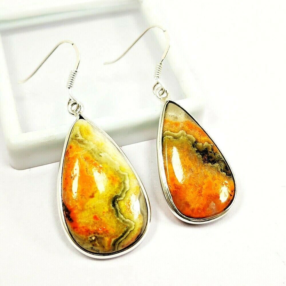 BUMBLE BEE JASPER GEMSTONE 92.5 STERLING SILVER EARRING: NATURAL BUMBLEE BEE JASPER GEMSTONE 92.5 STERLING SILVER EARRING Product Type : EARRING Main Stone : BUMBLEE BEE JASPER Main Stone Shape : PEAR Main Stone Size : 28X16 MM Main Stone Color : MULTICOLOR