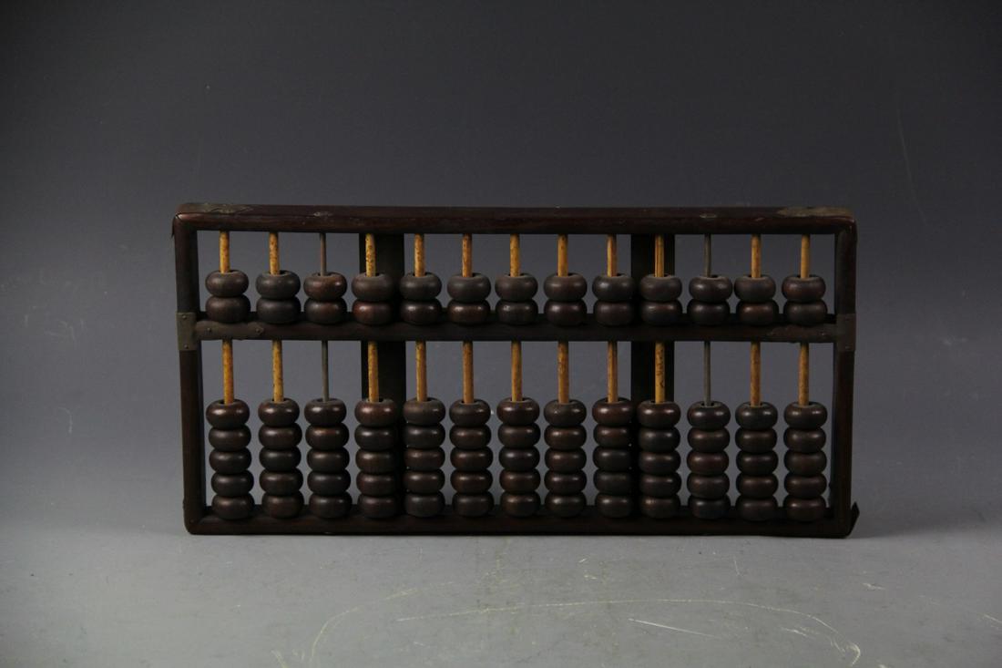 Chinese Hard Wood Abacus: China, ROC, hard wood abacus. Width 14 1/2 in., Length 7 1/4 in.