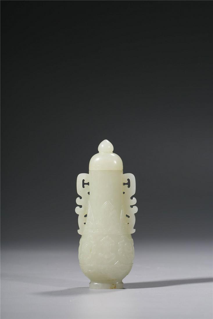 CHINESE. A WHITE JADE VASE (1 of 9)