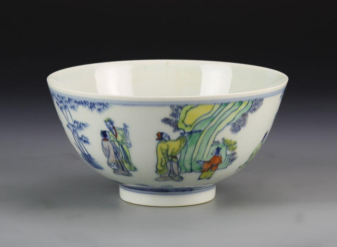 Chinese Doucai Bowl: China, ROC Period, Doucai bowl, with raised base, a white ground, with painted image of figures interacting within landscapes, Yongzheng mark. Height 5 7/8 in., Diameter 2 in.
