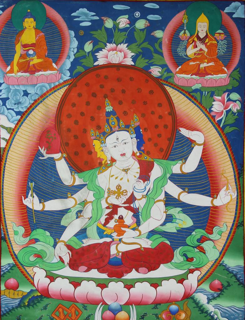 Chinese Tibetan Tangka: China, 20th C., Tibetan tangka, large multi-armed figure in center with two smaller figures in upper corners. Width 22 in., Length 28 1/2 in. Provenance private collection from Salem MA
