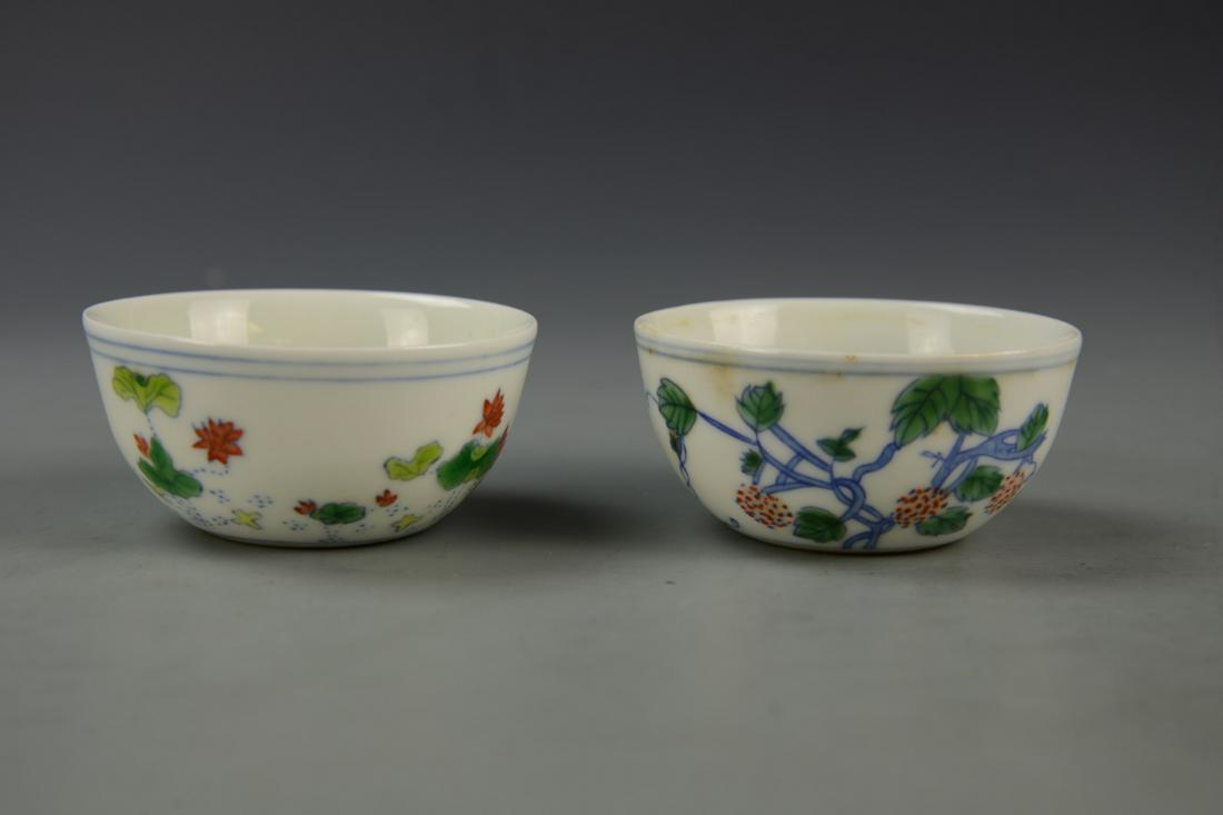 Chinese Pair Of Doucai Bowls: China,a pair of Doucai bowls, with mark on base. 3 1/8 in.,1 1/2 in.