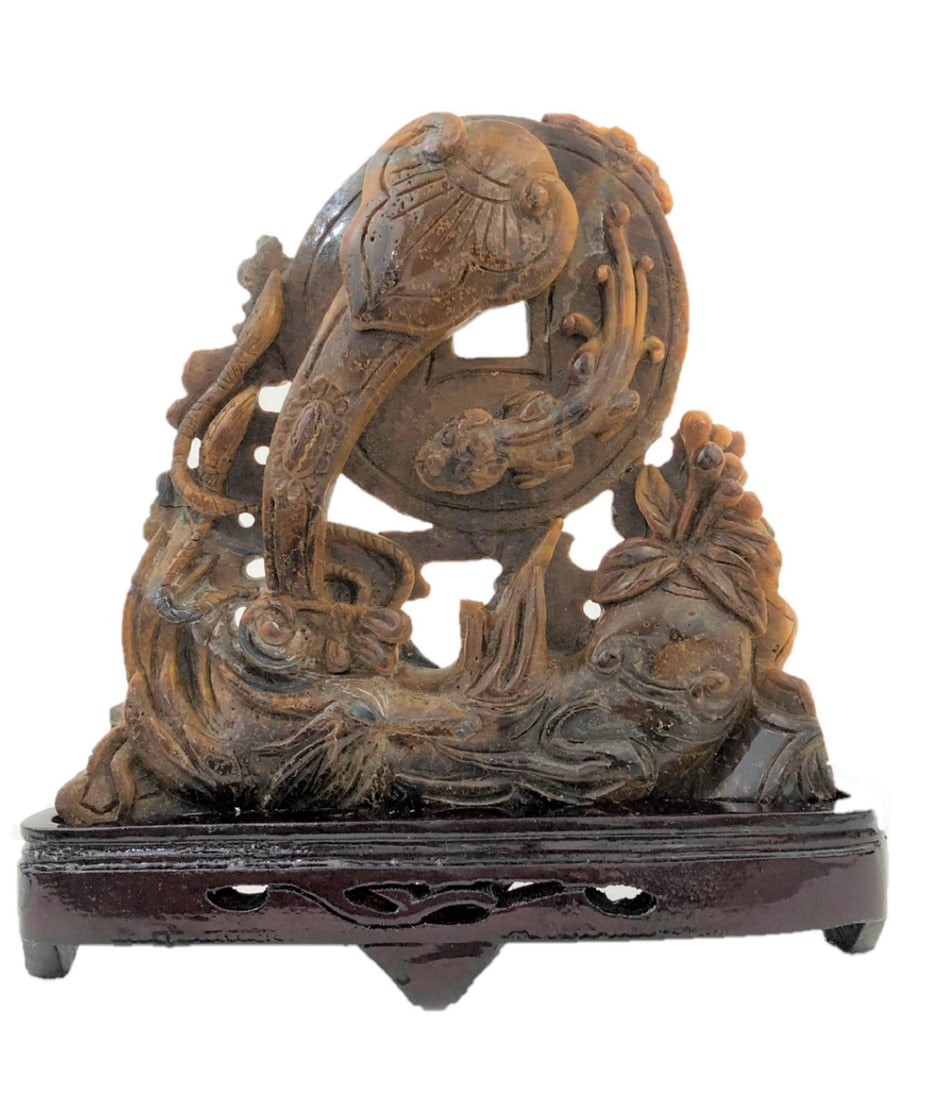 Chinese Carved Tiger Eye Figure: Chinese Carved Tiger Eye FigureChinese Carved Tiger Eye Figure.Dimensions 7 1/2"H x 7 1/4"W x 1 1/2"Dincluding the wooden base.