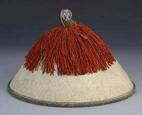 Chinese Qing Dynasty Officer's Hat: China, Qing dynasty, officer's hat with a crystal finial, mostly white, with a large amount of red fringe originating from the top. Diameter 12 3/4 in., Height 8 1/4 in.