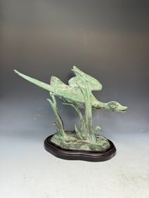 Vintage bronze sculpture of a bird