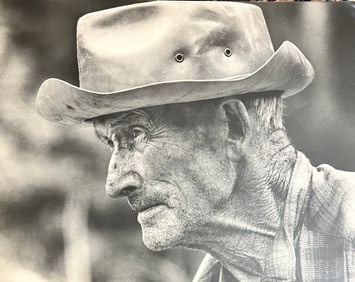 Large format, photography photographer, unknown sign on bottom left