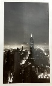 Titled written in the back empire State building at night