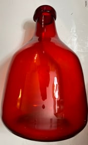 Giant ruby red bottle hand blown over