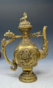 A vintage Chinese or Tibetan-style ritual wine ewer or teapo