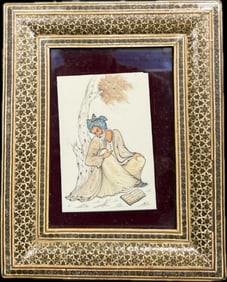 A framed Persian miniature painting