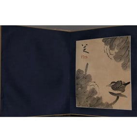 A PAPER ALBUM OF FLOWERS AND BIRDS PAINTINGS.