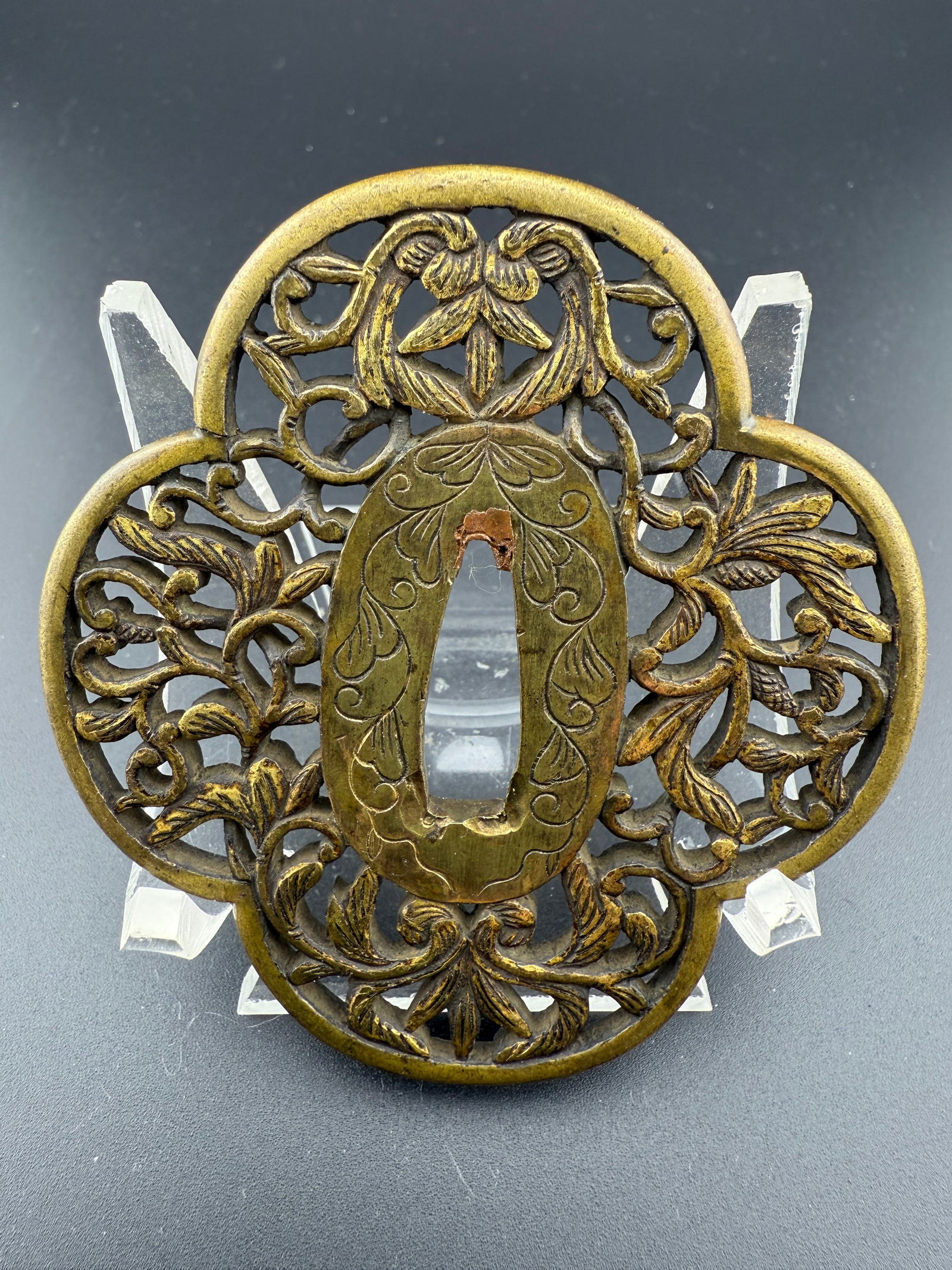Japanese Ky?-Sukashi Tsuba, Edo Period, 17th–18th Century: Antique Japanese tsuba from the Ky?-Sukashi school, Edo period (17th–18th c.). Openwork (sukashi) design featuring an elegant floral and foliage motif in symmetrical arrangement. Made of copper allo