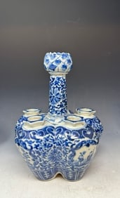Antique Chinese blue and white porcelain vase, also known as a tulipiere or tulip vase.: Antique Chinese blue and white porcelain vase, also known as a tulipiere or tulip vase. Approximately night and quarter inches high. Minor chip on one of the rim