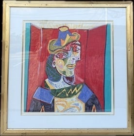 A framed print of Pablo Picasso's "Buste de Femme": A framed print of Pablo Picasso's "Buste de Femme". This iconic work is a portrait of a woman, and Picasso created several versions . Approximately 18 x 18”, minor dents, and scratches on frame,