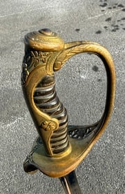 An antique Japanese officer's sword with a metal scabbard (1 of 10)