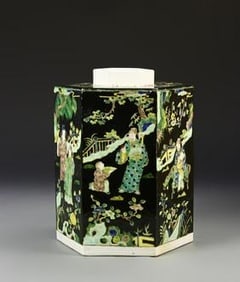 Antique Chinese Famille Noir Tea Candy: China, Qing Dynasty, Famille Noir tea caddy. Kang Xi mark. Black ground with white base and lid. Depicting figures in a wooded setting. Height 10 3/4 in.