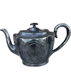 An antique silver-plated teapot, likely from the late 19th or early 20th century (1 of 8)