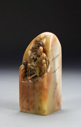 Antique Chinese Shoushan Seal Chop: China, 19th C., Shoushan Seal Chop, expertly carved of a mystical scene, richly hued in pinkish brown tones with a hint of yellow and white, intricate patterns carved on base. Height 4 1/4 in.