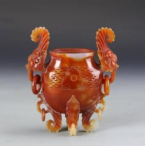 Antique Chinese Agate Censer: China, antique agate censer, round body with tapering neck, two sets of handles, one large looped pair at the mouth adorned with carved animal head ornaments, in mottled orange and white, with