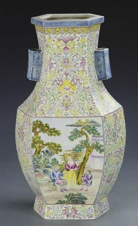 Antique Chinese Enameled Famille Rose Double Ear Vase: China, 18th or 19th C., enameled Famille Rose vase, hexagonal body, flat rimmed mouth, with two blue decorative ears, tapering sides to a high footed base, dense light colored floral design and