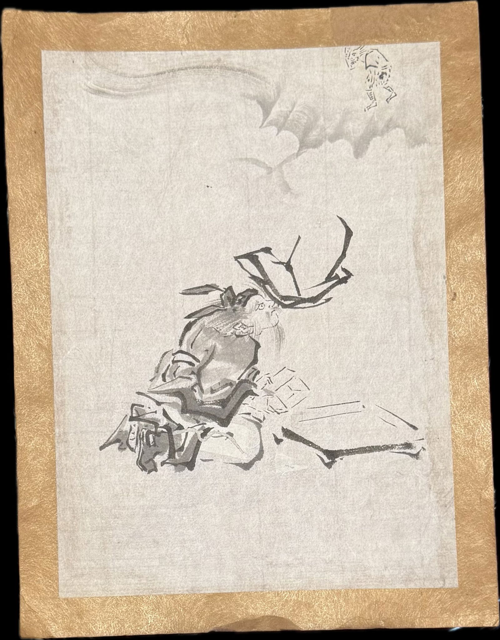 Antique Japanese sumi ink painting on a paper: Antique Japanese sumi ink painting on a paper depicting a scene featuring a clown entertaining an old couple with a box. Sumi-e (suiboku-ga), a traditional Japanese monochrome ink painting style. 10&r