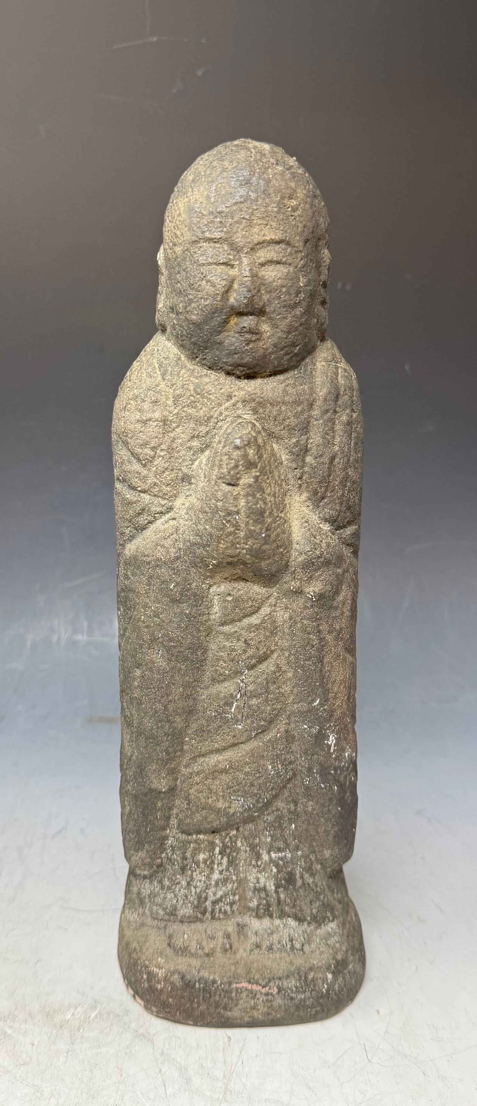 Antique Japanese Stone Buddha Jizo Bosatsu: An antique Japanese Jizo stone statue, representing a revered Bodhisattva in Buddhism who acts as a protector of travelers, women, and children.Bodhisattva in Buddhism who acts as a protector of trave