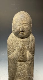 Antique Japanese Stone Buddha Jizo Bosatsu: An antique Japanese Jizo stone statue, representing a revered Bodhisattva in Buddhism who acts as a protector of travelers, women, and children.Bodhisattva in Buddhism who acts as a protector of trave