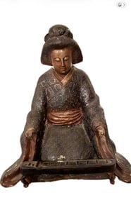 A Japanese bronze statue depicting a female musician playing a koto.: A Japanese bronze statue depicting a female musician playing a koto, 14 1/2” x 11 1/2”