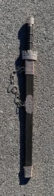 A Chinese straight sword, or Jian, with a wooden scabbard and decorative metal fittings: A Chinese straight sword, or Jian, with a wooden scabbard and decorative metal fittings, 37 1/2”, the sword cannot be opened