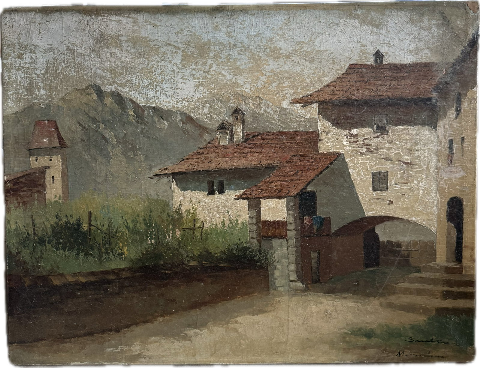 An antique oil painting on canvas: An antique oil painting on canvas that appears to depict a rustic European village scene with traditional stone buildings, red-tiled roofs, an arched passageway, and mountains in the background. Signe