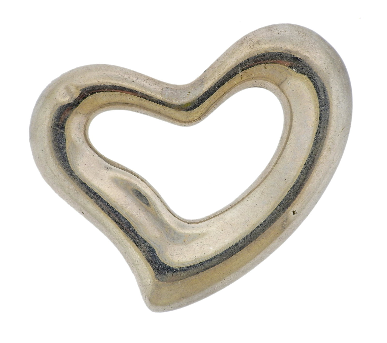 Tiffany & Co 1970s Peretti Sterling Silver Heart Belt: Large sterling silver heart belt buckle by Elsa Peretti, designed by Tiffany & Co. Comes with T & Co pouch. Measures 53mm x 66mm, belt insert is 1" wide. Marked: Peretti, Tiffany & Co, Italy, 1975, St