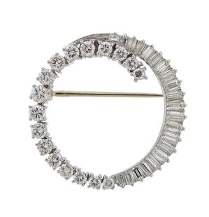 McTeigue Platinum Diamond Open Circle Brooch Pin: Platinum open circle brooch, set with baguette and round diamonds - approx. 2.40ctw. Brooch is 30mm in diameter. Marked: Maker's Mark Irid. Plat. Weight - 8.5 grams.