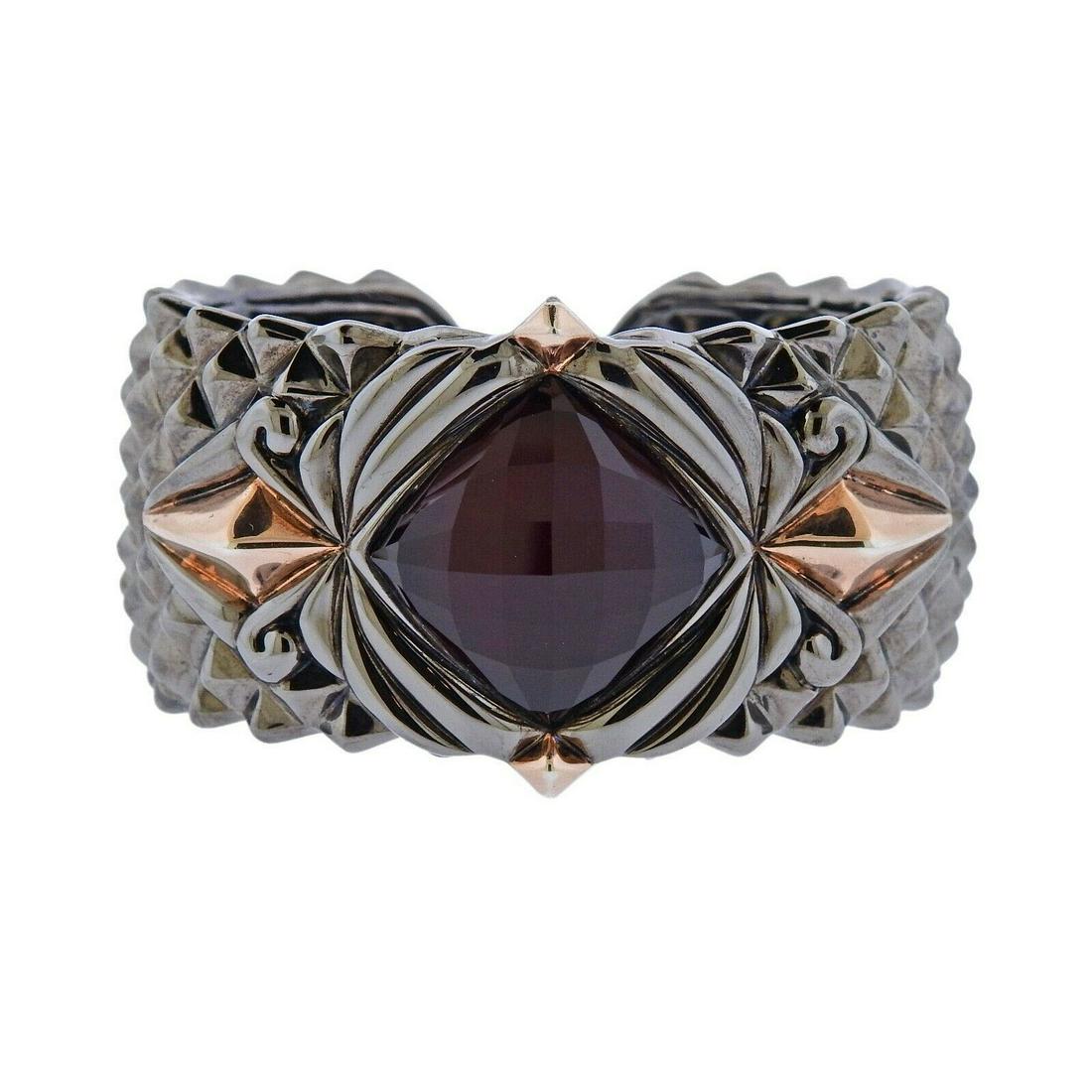 Stephen Webster Superstud Silver Crystal Bracelet: New rhodium plated silver Rockstud cuff bracelet by Stephen Webster, with red crystal. Bracelet will fit approx. 6.5" wrist and is 37mm wide at widest point. Marked: 925 and SW hallmark. Weight - 109.