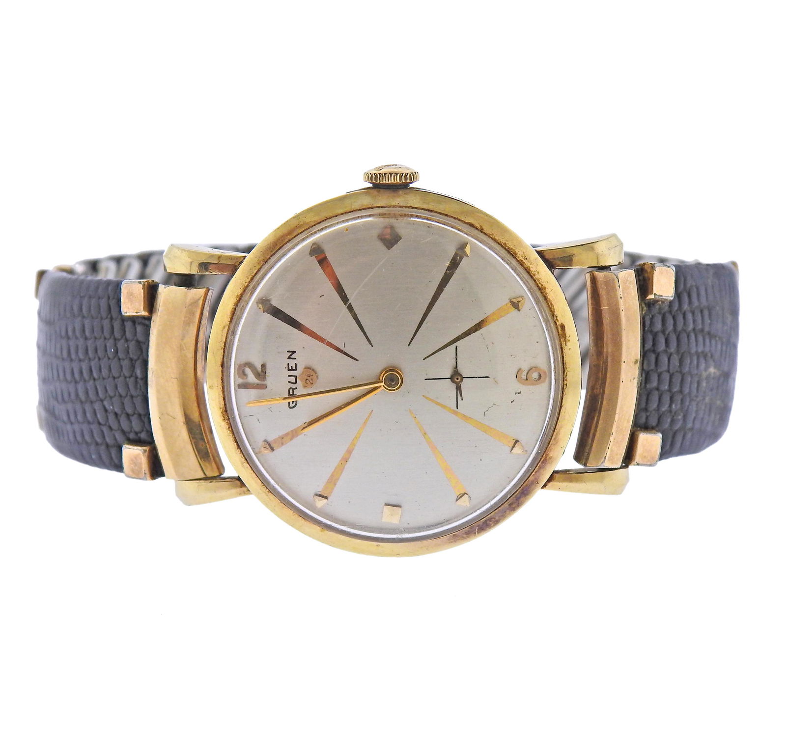 Gruen 14k Gold Vintage Watch: Vintage 14k gold Gruen watch head, with stretchy non gold bracelet. Case is 33mm in diameter. Band will fit an average 7-7/5" wrist. Manual wind movement in working order