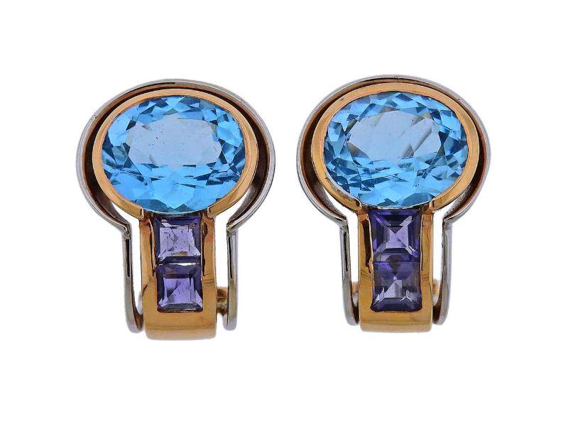 Antonini Blue Topaz Amethyst Gold Earrings: 18k white and yellow gold earrings by Antonini, decorated with amethyst and blue topaz. Earrings are 21mm x 16mm and weigh 16.8 grams. Marked Antonini, 1223 MI, 750.